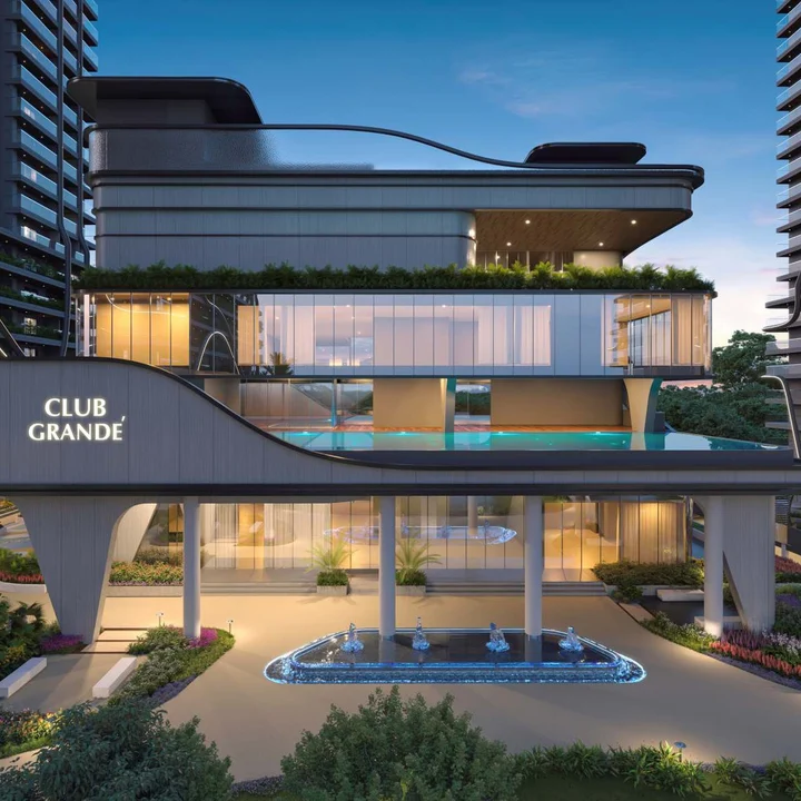 Fortune Suraj Bhan Grande Club Grande clubhouse exterior with fountain basin and terrace pool