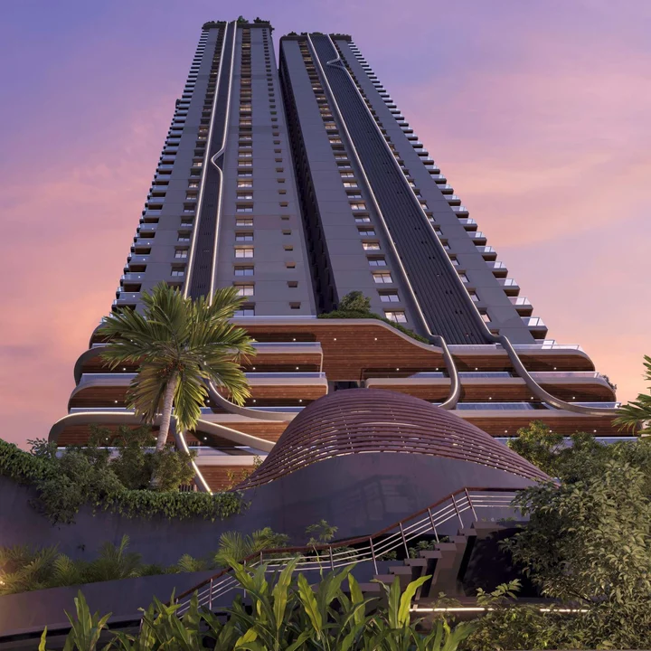 Fortune Suraj Bhan Grande tower rising above the planted podium terraces at dusk